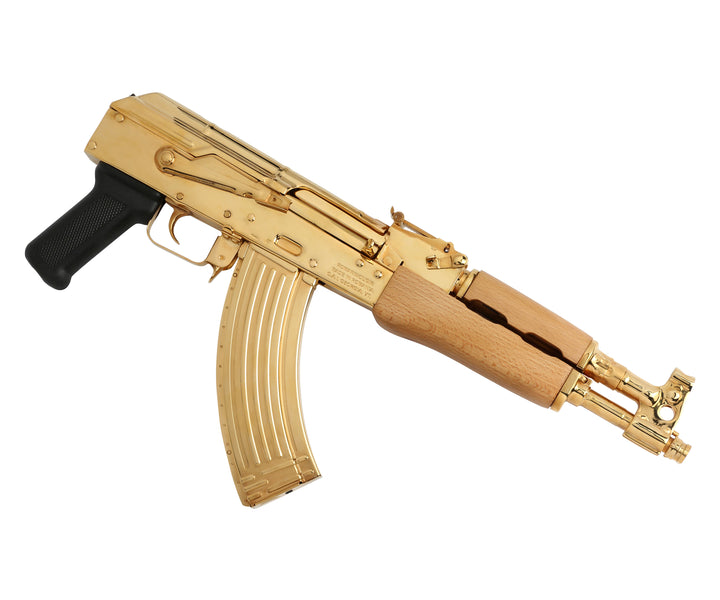 24K Gold Plated Century Arms Draco, high polished to a mirror finish. The Century Arms Draco wraps the AK style into the pistol format. Chambered in 7.62x39mm this semi-automatic pistol has a 12" barrel. While it comes standard with a 30-round magazine the Century Arms Draco is compatible with any AK double stack magazine or drum. The barrel includes an integral front sight and gas tube. SKU: 7783559135334 MFG MODEL NO: HG1916N UPC: 787450044357 DESCRIPTION: Century Arms HG1916N BRAND: Century Arms MODEL: D