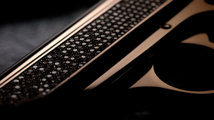 Close-up of the Oasis Edition slide showcasing 516 hand-set natural white diamonds in VS1 G-color clarity.,UPC # 723364209932