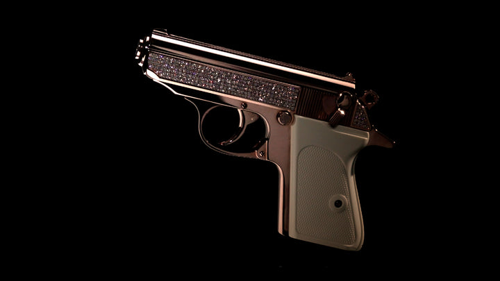 Diamond arrangement and surface detail along the slide of the Walther PPK Oasis Edition in 18K Rose Gold,UPC # 723364209932